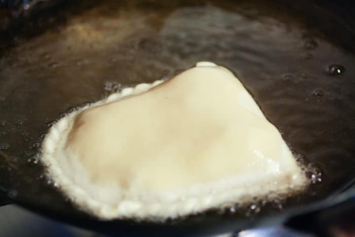 frying Bolivian Cheese Empanadas