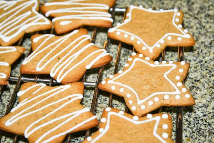 decorated Crunchy Gingerbread Cookies on a cooling rack