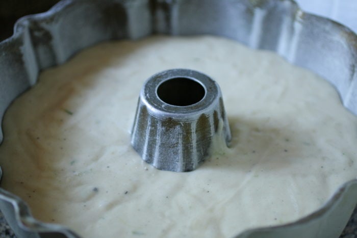 Lemon bundt cake with ginger and black pepper in a bundt pan