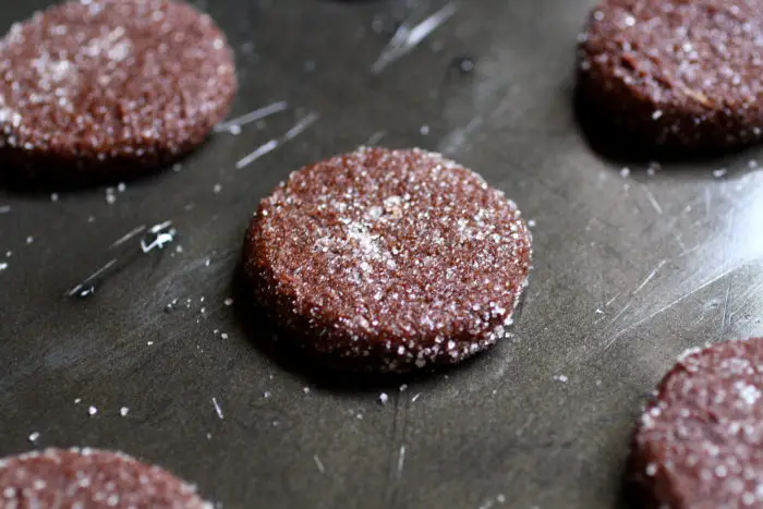 round chocolate cookie on a black tray