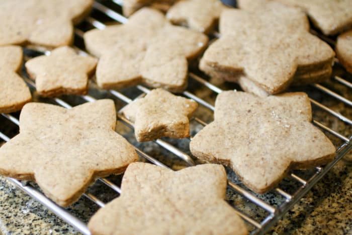 star shape cookies on a cooling rack.