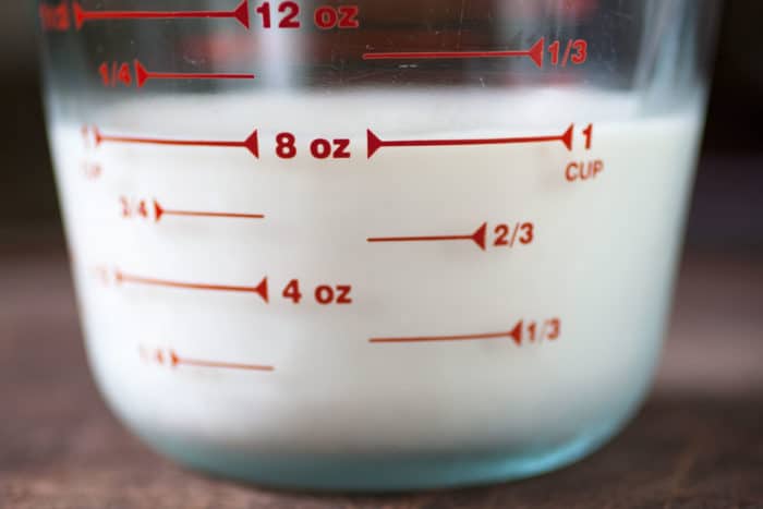 Milk in a measuring cup