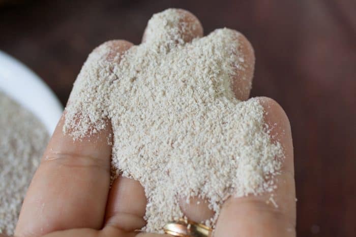 hand holding cassava flour