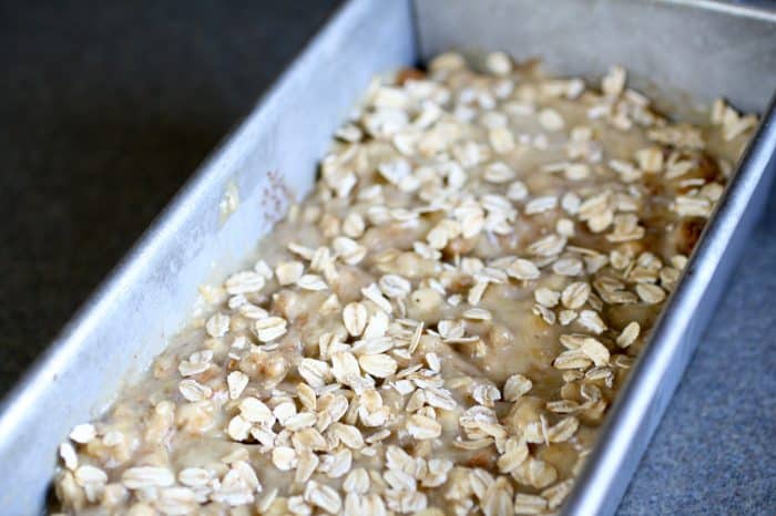 banana bread batter in a loaf pan