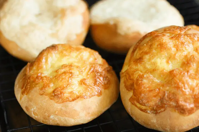 Bolivian cheesy rolls on cooling rack