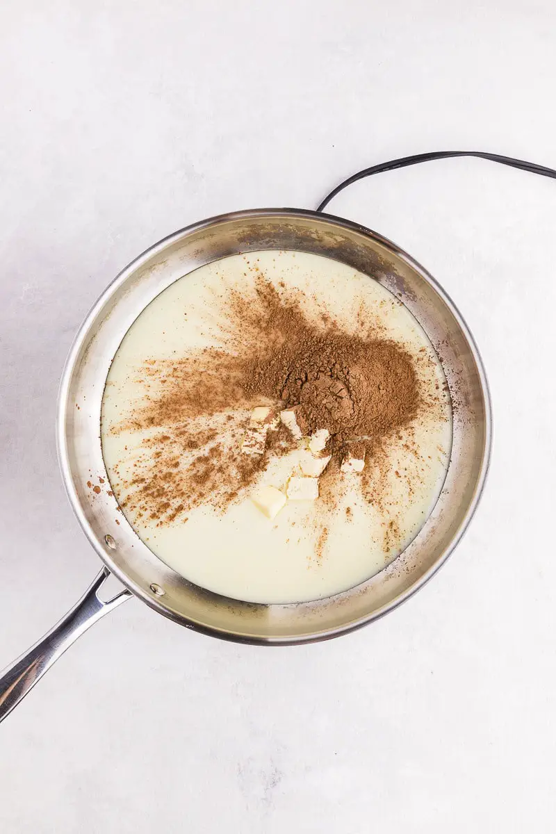 condensed milk, cocoa powder and butter in a pan